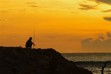 Premium Photo Silhouette Fisherman And Sunset Photography
