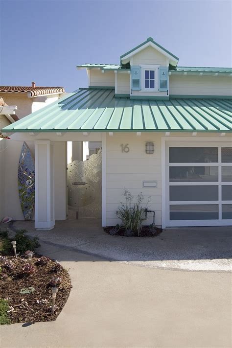 Painting the exterior of your home can make a big impact on its value. Metal roof Beach house Coastal home with metal roof Metal roof Beach house ideas Metal roof ...