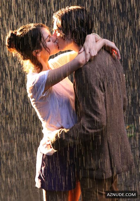 Selena Gomez And Timothee Chalamet Kissing During A Romantic Rainy