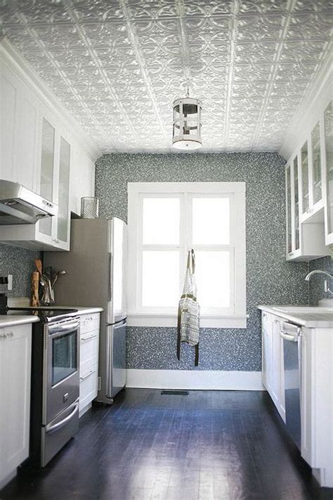 I had this idea of adding faux tin ceiling tiles to my kitchen island. Before & After: An Ontario Bungalow Brings The Sea Indoors ...
