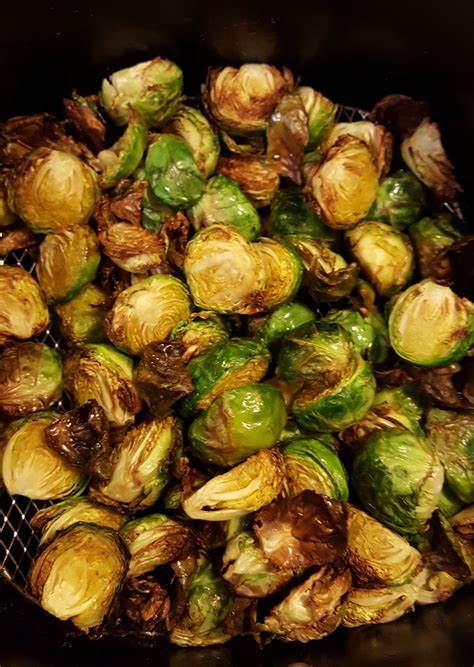 As the popping slows, gently stir the sprouts and let them fry for a few minutes until golden brown. Healthy Fried Brussel Sprouts Recipe made in an Air Fryer!!! | Coupons For Your Family