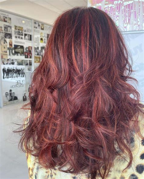top 30 red highlights on black hair ideas 2021 updated tattooed martha