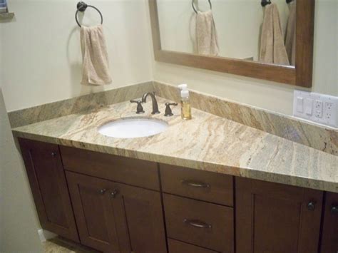 In this master bathroom, stark white subway tile contrasts beautifully with black hexagon mosaic tiles. 30 interesting bathroom countertop granite tile picture ...