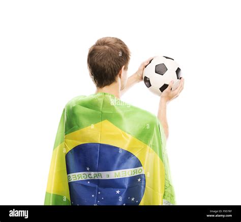 Brazilian Soccer Fan Holding Ball And Flag Of Brazil Isolated On White