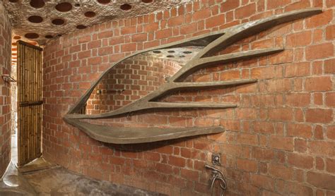 Instead of building a boring straight up staircase, cutting it in half and having each case lead in opposite directions creates super fun and geometric structure. Gallery of Brick House / iStudio architecture - 15