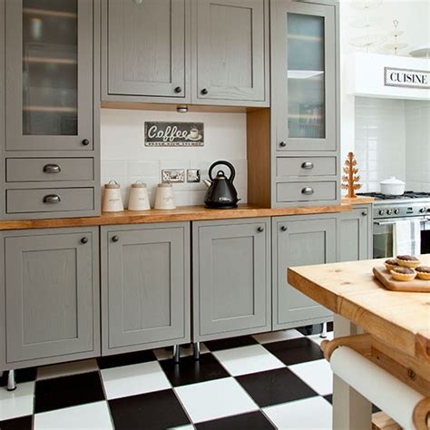 Grey kitchen ideas to inspire. Grey Shaker-style kitchen with tiled flooring | Decorating | housetohome.co.uk
