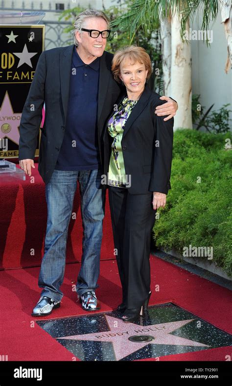 Maria Elena Holly Poses With Gary Busey In Front Of Buddy Hollys Star