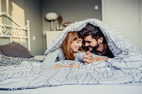 Portrait Of Young Loving Couple In Bed Stock Photo Download Image Now