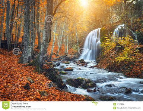 Waterfall At Mountain River In Autumn Forest At Sunset