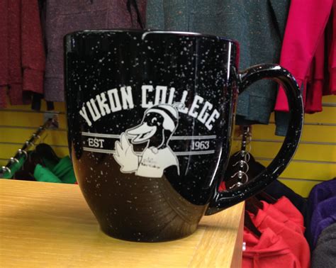Luna The Yukon Colleges Mascot Design On A Coffee Cup Mascot