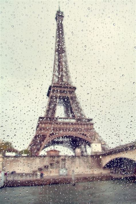 View On The Eiffel Tower Through The Window With Rain Drops Stock