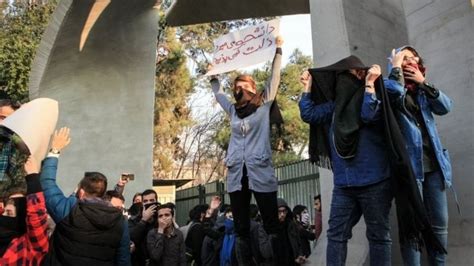 Woman Becomes Face Of Iran Protests Despite Not Being There Bbc News