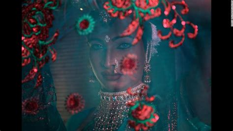 a transgender woman waits to perform at an event raising funds for the transgender community in