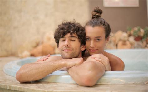 Loving Couple Having Relaxation In Bathtub At Resort · Free Stock Photo