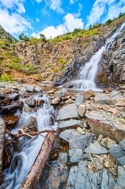 Premium Photo Image Of Waterfall Down Angled Slope Of Gray Rocks In