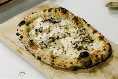 #Fabbrica's Funghi pizza with truffle crema, mozzarella and mushroom ...