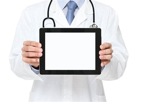 Doctor Holding Ipad Stock Photos Pictures And Royalty Free Images Istock