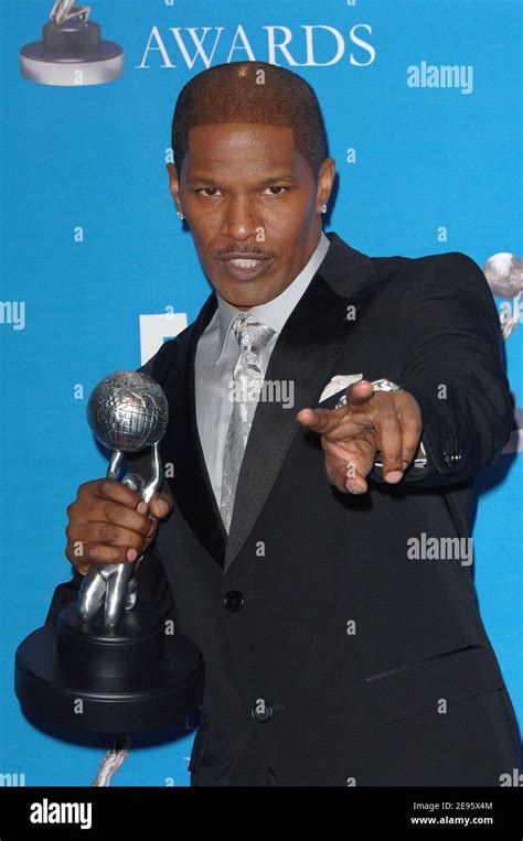 Jamie Foxx Receives The Outstanding Male Artist Award At The 37th Naacp