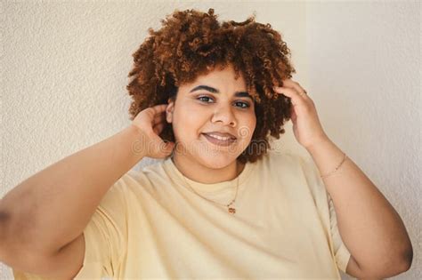 Beautiful Happy Smiling Curvy Plus Size African Black Woman Afro Hair With Make Up Posing In