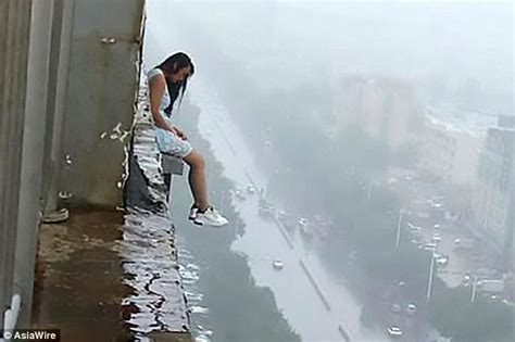 Woman Jumping Off Building