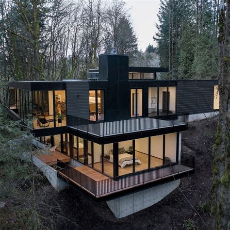 Black Wood And Glass Volumes Stagger Down Oregon Woodland To Form Royal