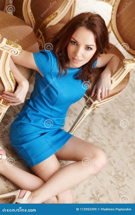 Brunette Girl In Blue Dress Stock Image Image Of Furniture