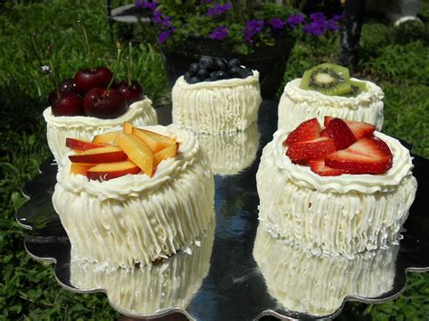 I had made several angel food cakes before we were married, but the last one i made flopped so bad and wasted so many eggs i never had the nerve so there are some of the traditional tips for making a successful angel food cake. Angel Food Cake Decorating Ideas & Inidual Angel Food Cakes Topped With Fruit
