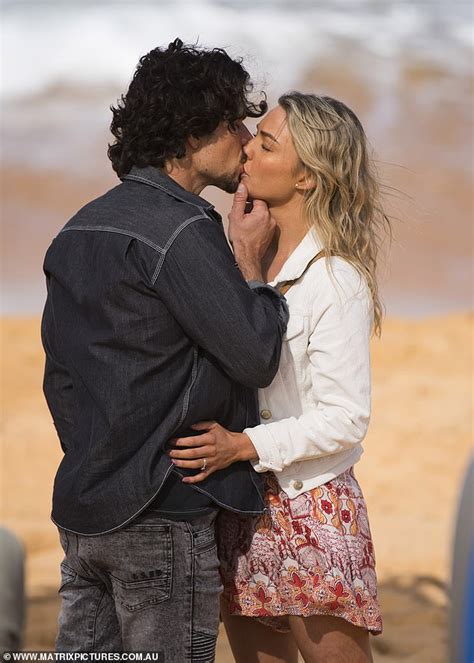 Sam Frost Shares A Steamy Kiss With Co Star Luke Arnold As They Film Scenes For Home And Away