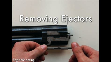 Removing And Replacing The Ejectors Of An Over And Under Shotgun Gun