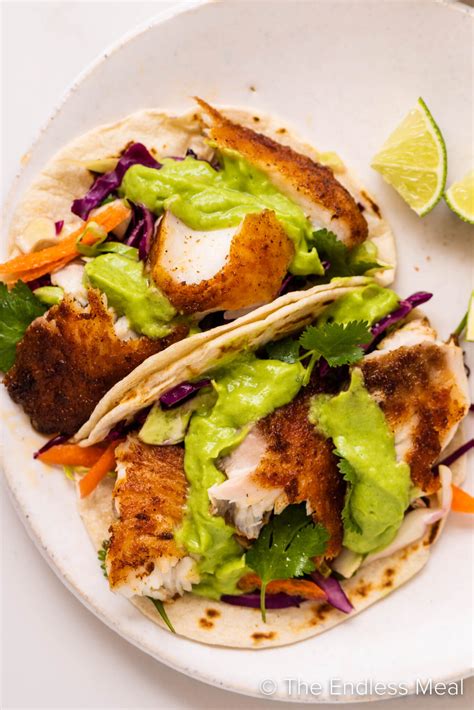 Baja Fish Tacos With Slaw And Avocado Sauce The Endless Meal