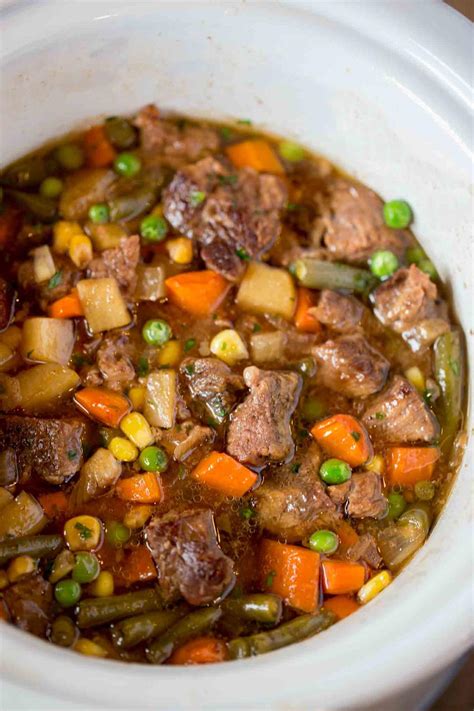 Best homemade vegetable beef soup from delicious soup recipes saving room for dessert. Slow Cooker Vegetable Beef Soup | RecipeLion.com