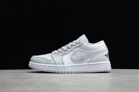 A clean solid white rubber sole completes the design. Air Jordan 1 Low GS DC6039-100 White Photon Dust Grey Fog ...