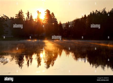 Beautiful Sunrise Over A Lake Stock Photo Alamy