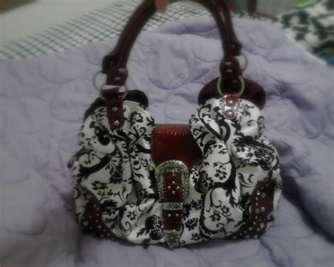 my favorite purse of mine i got it from classy n sassy boutique and there are so many cute