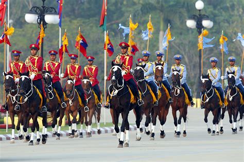 Myanmar Military Soldiers Ride Horses As They Take Part In A Parade