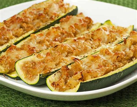 Zucchini cut in half and hollowed out to create boats then filled with a spicy, tomato, sausage filling, topped with panko breadcrumbs and parmesan cheese, and baked until it's. Stuffed Zucchini Boats | Alliance Work Partners