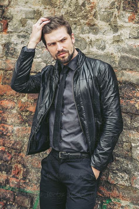 Handsome Man Wearing Leather Jacket And Tie By Stocksy Contributor