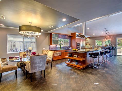 More and more homeowners are looking to integrate all the social areas of their house, such as the kitchen, the dining room, and the living room. Open Concept Kitchen and Dining Room With Porcelain Wood ...
