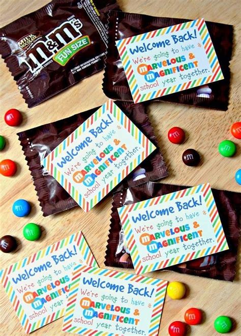 Candy Bar Wrappers With Welcome Back Labels And Candies Scattered