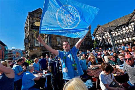 Fans Celebrate Manchester Citys Historic Treble In Pictures