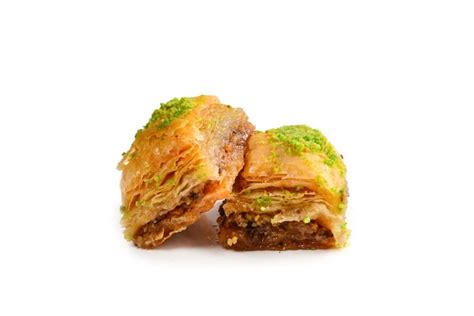 Premium Photo Pistachio Baklava On A White Background Dessert