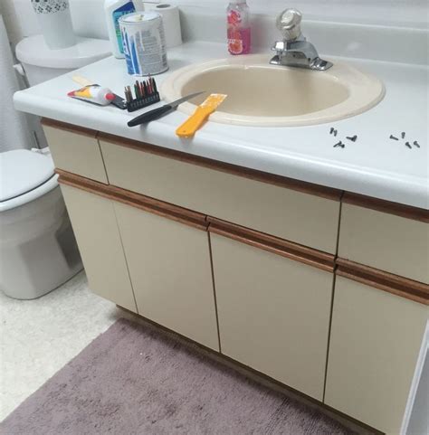 Maybe you would like to learn more about one of these? Bathroom Update + How to Paint Laminate Cabinets — The ...