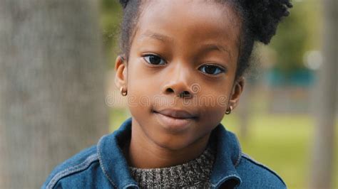 Close Up Cute African American Baby Girl Looking Standing Outdoors