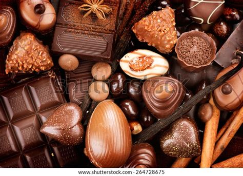 Arrière Plan Chocolatchocolat Assortiment De Chocolats Fins Photo