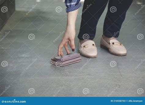 Woman And A Wallet On The Ground In Street Stock Image Image Of Risk