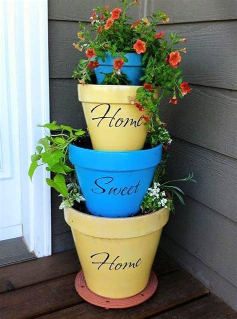 Pin By Boots Thomas On Craft Ideas Stacked Flower Pots Garden