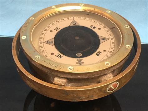 19th century brass ships compass in gimble stamped with patt 0183 no 10874m 15 cm diameter