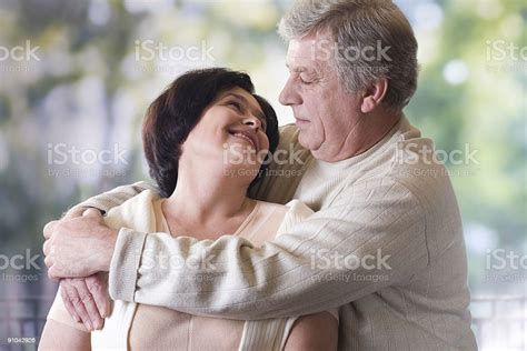 Happy Old Couple Embracing Outdoor Stock Photo Download Image Now