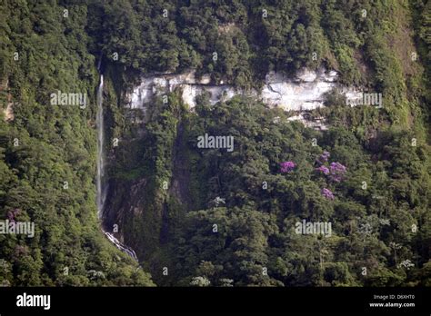 Waterfall On A Vertical Cliff In Rainforest In The Amazonian Foothills