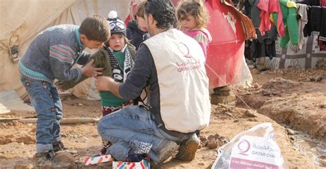 Qatar Charity Provides Winter Clothes To Orphans In Syria Whats Goin